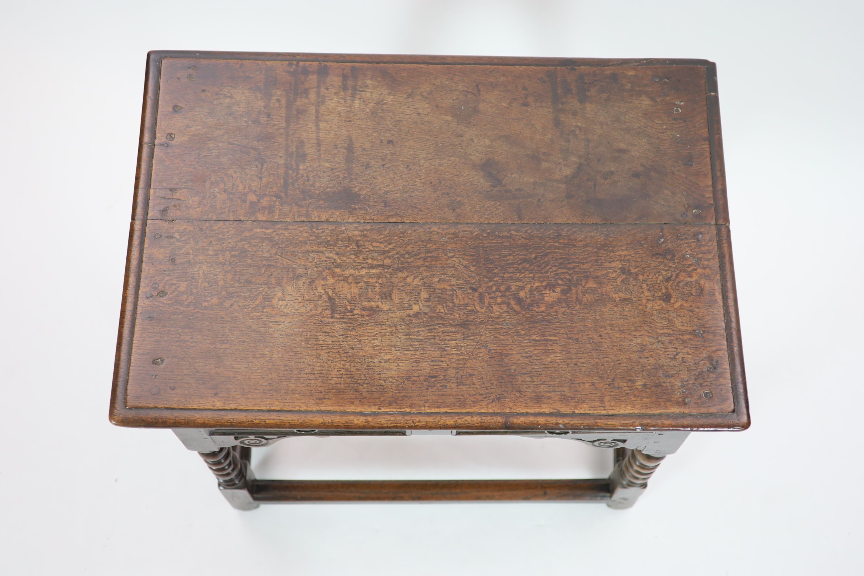 A Charles II oak side table H 68cm. W 82cm. D 56cm.